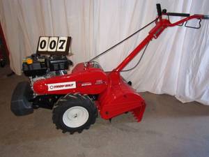 lot 7 image: Troy-Bilt 22 Dual Direction Rear Tine Tiller