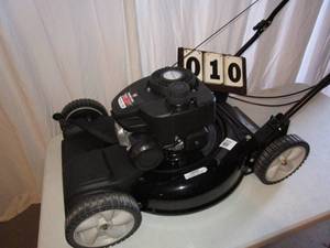 lot 10 image: Yard Machines 21 2-N-1 FWD Lawn Mower