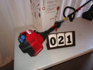 lot 21 image: Troy-Bilt Curved Shaft GasTrimmer