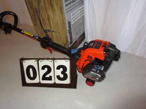 lot 23 image: Remington Curved Shaft Gas Trimmer