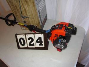 lot 24 image: Remington Straight Shaft Gas Trimmer