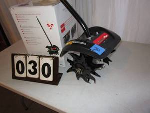 lot 30 image: Trimmer Plus 4 Tine Cultivator Attachment