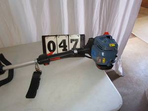 lot 47 image: Senix Gas Powered Pole Saw