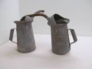 lot 49 image: vintage oil cans