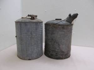 lot 51 image: vintage oil cans