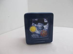 lot 111 image: John Wayne coin bank