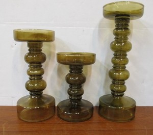 lot 116 image: Set of 3 Graduating Size Olive Glass Candle Stands