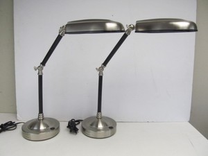 lot 67 image: Matching Pair of Working ChromeBlack Articulating Desk Nightstand Reading Lamps