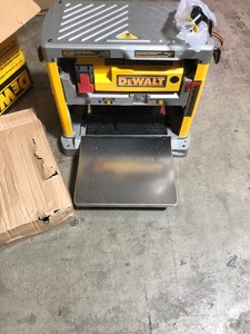 lot 51 image: DEWALT 15 Amp 12-12 in. Corded Planer IN WORKING CONDITIONS