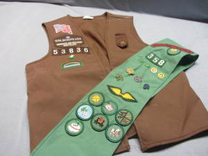 lot 18 image: Girl Scout Vest, Sash, Merit Badges