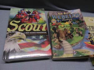 lot 23 image: Scouting Handbooks, Badges, Slide, Garters
