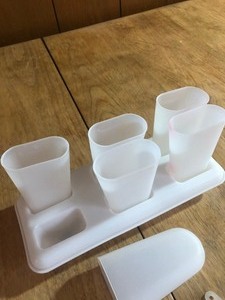 lot 110 image: VINTAGE 6 PIECE TUPPERWARE POPSICLE CONTAINERS SET