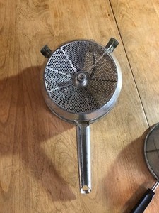 lot 130 image: MISCELLANEOUS VINTAGE COOKWARE  BUNDT PAN STRAINER FOLEY FOOD MILL