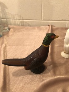 lot 149 image: AVON DECORATIVE AFTERSHAVE BOTTLES SOME WITH LIQUID IN THEM.