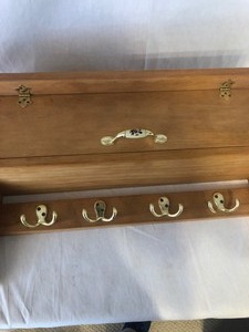 lot 194 image: WOOD SHELF WITH COAT HANGERS