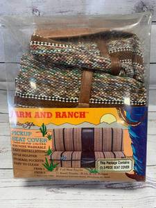 lot 19 image: Pickup Seat Cover with Shotgun Pocket (new old stock)
