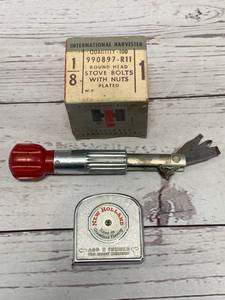 lot 98 image: New Holland Bolts, Multi Tool, Tape Measure