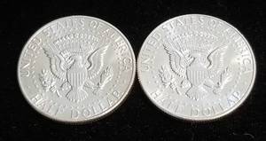 lot 34 image: 2 AU-UNC 1964 KENNEDY SILVER HALF DOLLARS