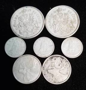 lot 40 image: GROUP OF 7 FOREIGN SILVER COINS