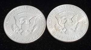 lot 47 image: 2 AU-UNC 1964 KENNEDY SILVER HALF DOLLARS