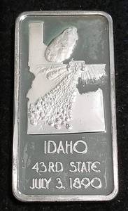 lot 65 image: 1 TROY OZ. .999 FINE SILVER ART BAR 50 STATES IDAHO AMAZING TONING