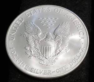 lot 70 image: 2002 AMERICAN SILVER EAGLE 1 TROY OZ. .999 FINE SILVER DOLLAR