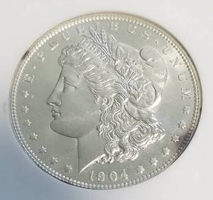 lot 15 image: 1904-O MORGAN SILVER DOLLAR MS64 NGC