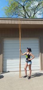lot 249 image: Lot of Three Very Long Vintage Single Piece Bamboo Fishing Poles