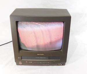 lot 124 image: Working 13 Inch Sharp TV VCR Combo