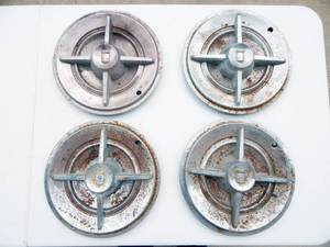 lot 167 image: Lot of Four Vintage Spinner Hubcaps
