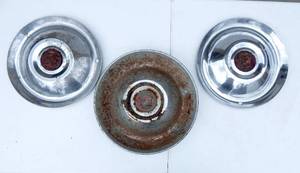 lot 175 image: Lot of Three Cadillac Hubcaps