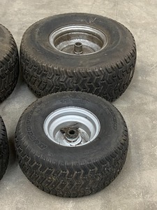 lot 21 image: Set Of (4) Lawn Tractor Wheels & Tires