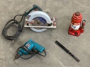 lot 38 image: (1) Bottle Jack, (1) Drill, (1) Circular Saw