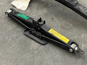 lot 54 image: (1) Trailer Leaf Spring & (1) Scissor-Style Jack