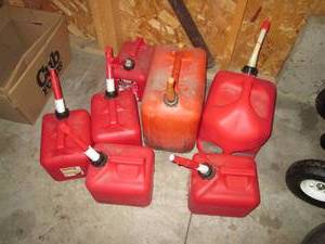 A Large Lot of Gas Cans...