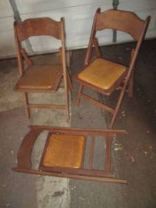 3 Wooden Folding Chairs...
