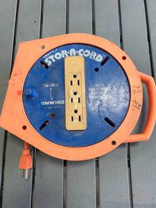 lot 14 image: 12 Foot Stor-a-Cord with Outlet