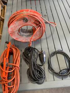 lot 27 image: Corded Reel & 3 Extension Cords