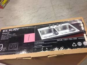 lot 1 image: Pergola Drop-In Stainless Steel 33 in. 4-Hole Double Bowl Kitchen Sink in good condition
