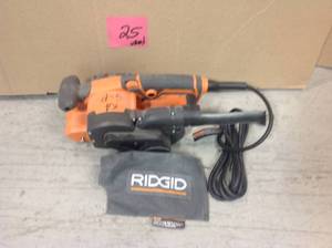 lot 25 image: RIDGID 6.5 Amp Corded 3 in. x 18 in. Heavy-Duty Variable Speed Belt Sander  USED