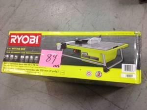 lot 89 image: RYOBI 7 in. 4.8 Amp Tabletop Tile Saw  USED