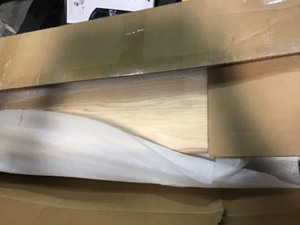 lot 114 image: Stair Parts 12-12 in. x 58-38 in. Red Oak Bullnose Starting Tread setof 4  not used