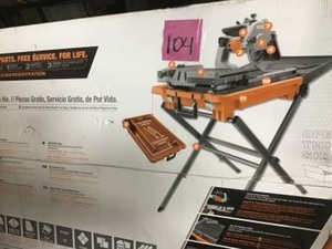 lot 104 image: Ridgid 12 Amp Corded 8 in. Wet Tile Saw with Stand in good condition