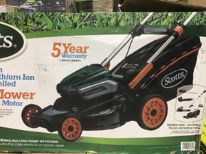lot 103 image: Scotts 21 in. 62-Volt Lithium-Ion Cordless Self-Propelled Walk Behind Mower with 4 Ah and 2.5 Ah Battery and Charger Included open box