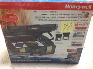 lot 77 image: Honeywell 0.39 cu. ft. Molded Fire Resistant and Waterproof Legal Document Storage Chest with Key and Double Latch Lock in good condition