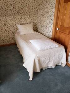 lot 54 image: Spring Air Back Bracer Twin Box Spring and Mattress with Bedding