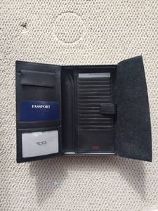 lot 151 image: Northwest Airlines Black Leather Tumi Travel Wallet
