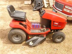 lot 2 image: Toro lawn tractor. 13 HP Briggs & Stratton engine. 38 Deck. Hydrostatic drive. Tested & works. Needs Battery & minor maintenance on switches. As shown.