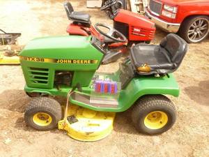 lot 3 image: John Deere STX38 for parts or repair. Untested. Kohler engine that turns over. No starter & is missing minor pieces. Very nice hood. As shown.