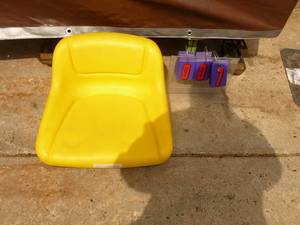 lot 7 image: John Deere style seat. New & unused. As shown.